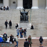 The steps of Low Memorial Library at Columbia University are a gathering place for students and visitors.