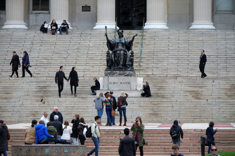 The steps of Low Memorial Library at Columbia University are a gathering place for students and visitors.